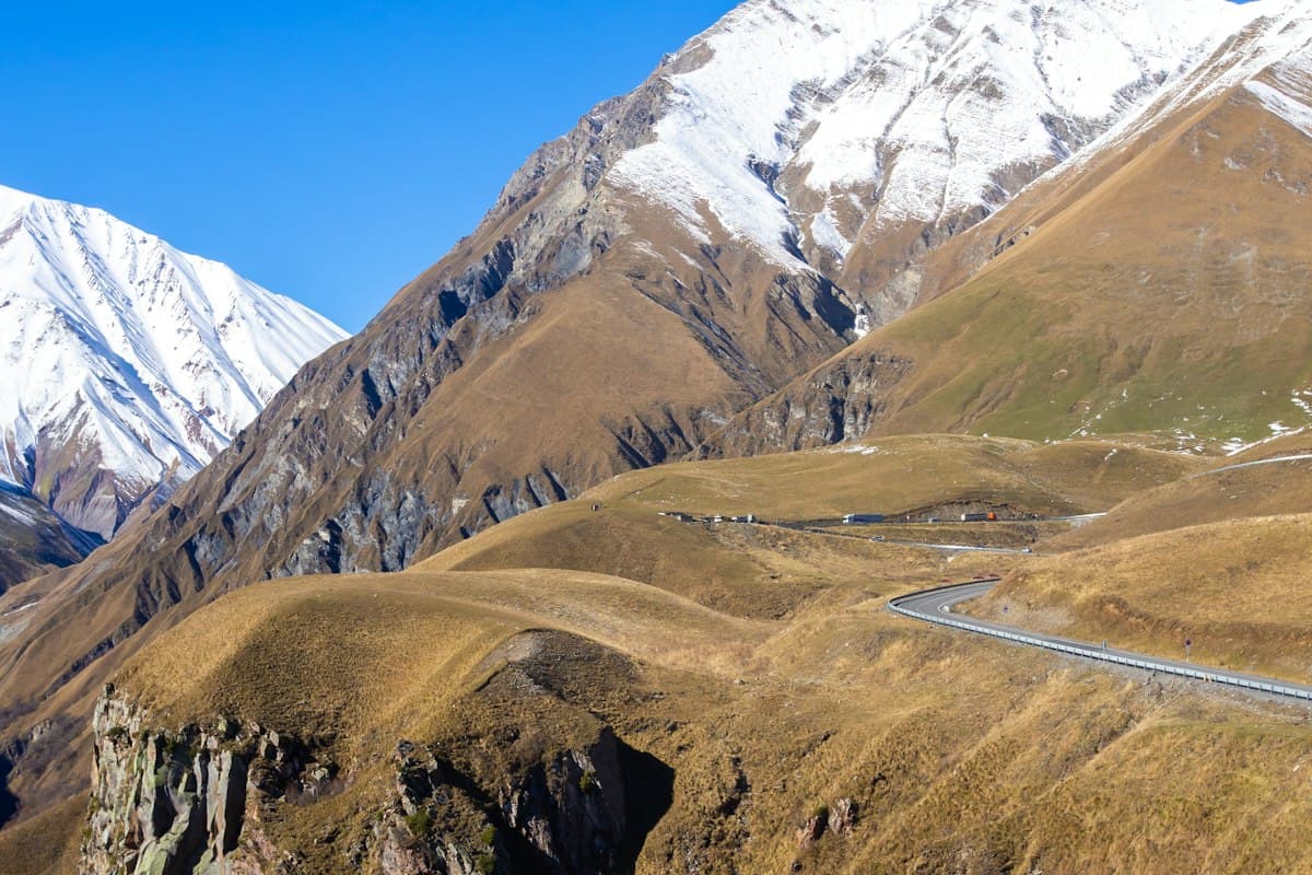 Georgian Military Road winding through the Caucasus toward Gudauri